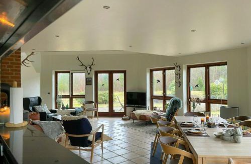 Skalstrup House | Octagonal Thatched Forest House Near Herning