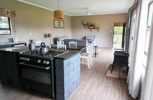 Kwa Sani House | Off-grid mountain cottage with mountain views on a peaceful smallholding