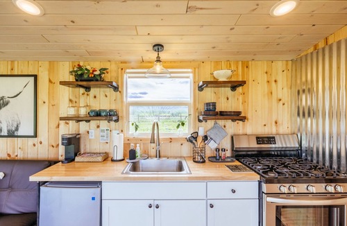 Whitehall House | Off-grid tiny home in apple orchard with million-dollar mountain views!