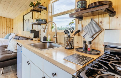 Whitehall House | Off-grid tiny home in apple orchard with million-dollar mountain views!