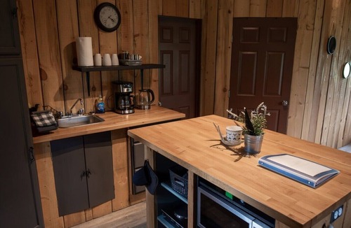 Division No. 11 Cabin | Off-Grid Wilderness Cabin with Mountain Views, Hot Tub, Sauna & Canoes