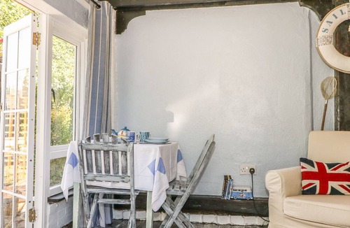 Burton Cottage | OLD BEAMS LODGE, pet friendly, with a garden in Burton, Dorset
