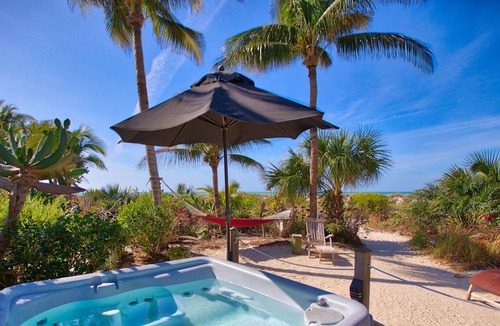Wulfert Cottage | Old Florida Beach Cottage, ON the beach, Pet Friendly, stargaze in the hammock