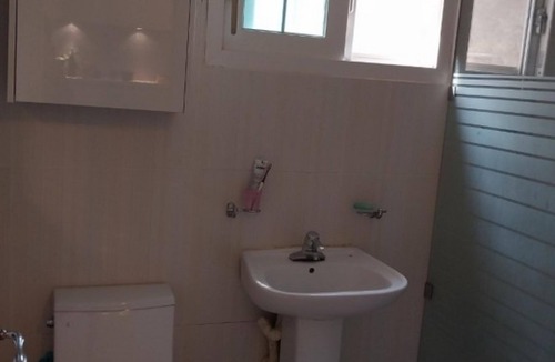 Wanju House | Olive Wanju Pension
