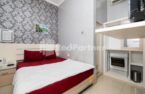 Malang Hotel | Omah Kalimosodo Mitra RedDoorz near Stasiun Malang Kota Baru