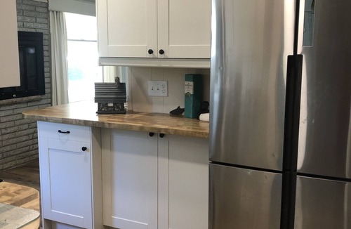Clam River Cottage | ON TORCH LAKE - SUNSETS - LG SANDY BEACH & YARD - PERFECT FOR FAMILIES BOOK 2027