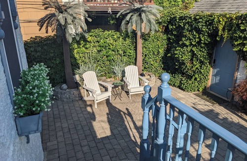 Long Beach House | "Once Upon a Tide" eclectic beach house with pizza oven, game room, fireplace