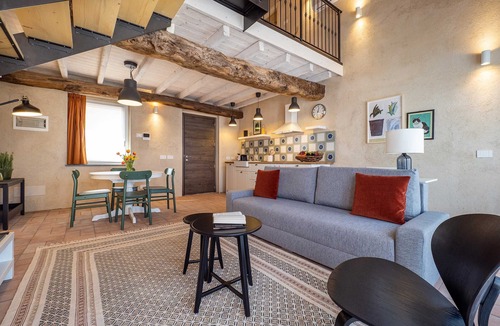 Cressa Apartment | One Bedroom Loft Style Apartment in Restored Farmhouse