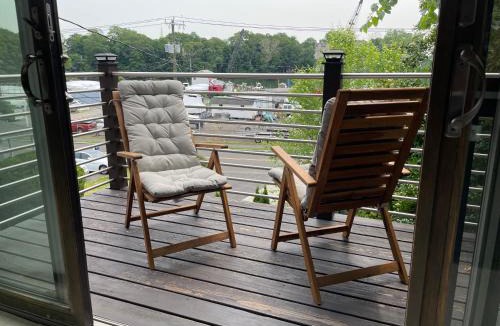 Cos Cob Apartment | One bedroom with modern kitchen, balcony with water view