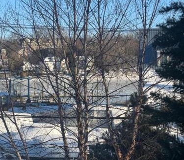Cos Cob Apartment | One bedroom with modern kitchen, balcony with water view