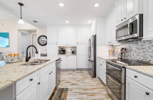 Whitney Beach Condo | One Particular Harbour 388-401 · Top Floor · Pool Lanai