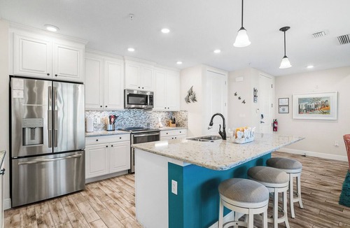 Whitney Beach Condo | One Particular Harbour 388-401 · Top Floor · Pool Lanai