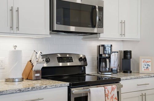 Whitney Beach Condo | One Particular Penthouse | Top-Floor Condo at Margaritaville Near Anna Maria Island