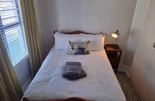 Mykonos House | OosiesRus - Charming Langebaan Villa with Garden View