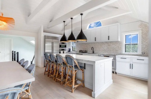 Madaket House | Open floor plan home with multiple decks