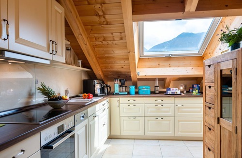 Garmisch-Partenkirchen Apartment | Open top floor apartment with exposed roof structure