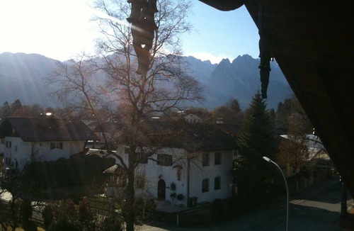 Garmisch-Partenkirchen Apartment | Open top floor apartment with exposed roof structure