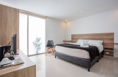 Modelia Hotel | Orange Wild