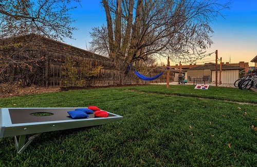 University Acres Condo | Orchard Flats | Perfect Group Stay w/Yard and BBQ