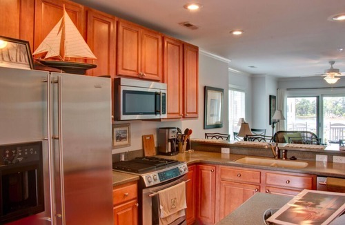 Oriental Condo | Oriental Harbor Place, B-8 - Unwind by the water