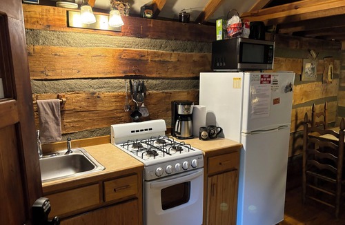 Leopold Cabin | Original 1850's log cabin butted up to the Hoosier National Forest.