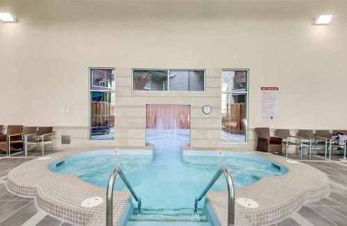Canmore Apartment | Outstanding Mountain Condo - Pool, Hot Tub & Waterslide!