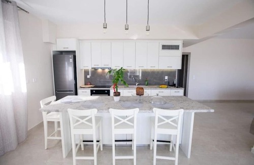 Lefkakia Condo | Over the horizon