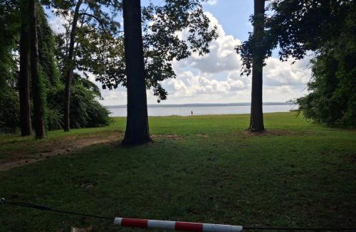 Shorterville House | Overlooking Lake Eufaula Alabama PERFECT PRIVATE GETAWAY COTTAGE FOR COUPLES FISHERMAN-FRIENDS located in a private gated community bring the golf cart many paved roads and boat parkingt BOAT DOCK NEAR and community fishing pier and beach
