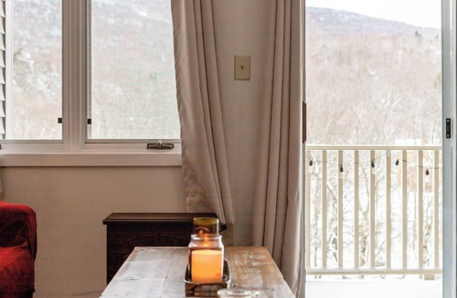 Lincoln Condo | Overlooking Loon Mountain’s South Peak, this newly renovated 1BR condo offers indoor and outdoor pools, indoor hot tub, sauna, and game room access—just minutes to hiking and Loon Resort. Coin laundry available on site.