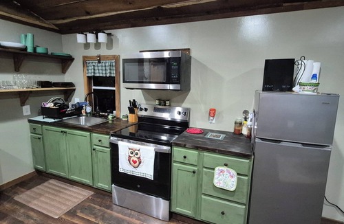 Evergreen Cabin | Owl's Nest, a rustic tiny house located 3.5 miles off I-65 in Evergreen, Alabama
