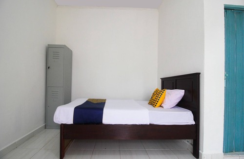 Mandau Hotel | OYO 2592 Homestay Bunda Puja