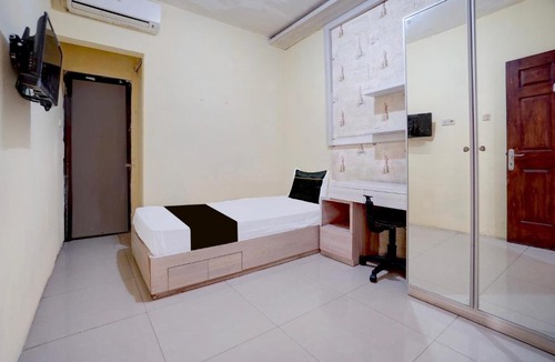 Surabaya Hotel | OYO Life 90606 Glass House Citraland Syariah