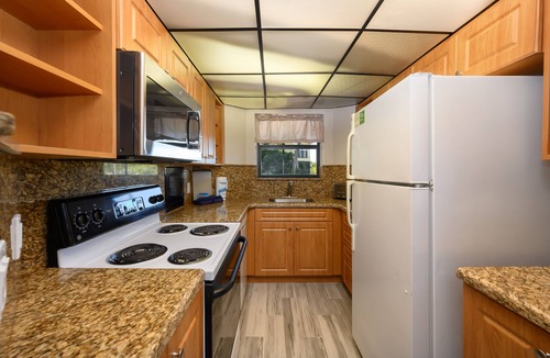 Marathon Villa | PA Beach, Pool, kitchen, Dock, Ocean View, BBQ, arrive any day, tropical, patios