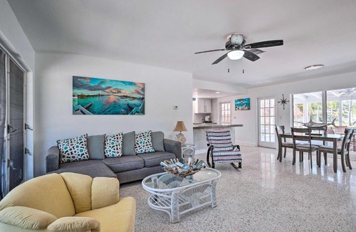Palm City House | Palm City Canalfront Home w/Boat Dock & Fire Pit!
