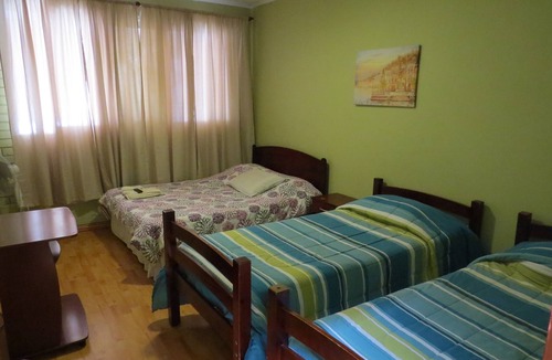 Cavancha Hostel | Palm Hostal