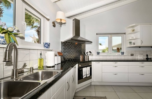 Palm Beach Villa | Palm trees, Private pool, Minutes from fabulous beaches.