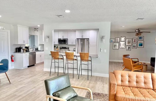 Indian Harbour Beach House | Palm Villa - 4 Bed, 2.5 Bath, Heated Pool, Hot Tub, Blocks to Beach, Sleeps 10+
