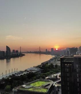 Downtown Shanghai Apartment | Panorama River Suite with bedside view of Huangpu river & sunset, Near Lujiazui & Metro Line 4