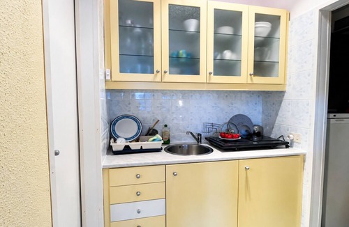 Susello Apartment | Panorama studio with 40 m² sunny balcony, pool & fantastic view of Lake Maggiore
