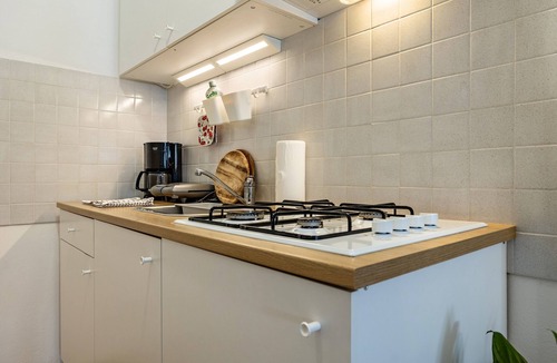 Malcesine Apartment | 'Panoramic Green' Studio with Lake View, Private Terrace and Wi-Fi