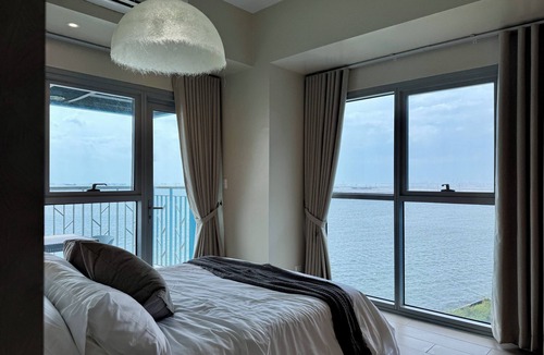 Tambo Condo | Panoramic Seaview near Airport Facing the Bay 14h