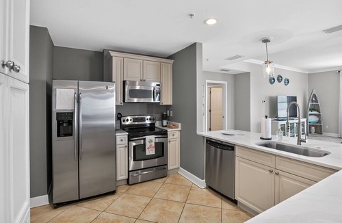 Upper Grand Lagoon Condo | Panoramic Stylish Gulf Retreat w/Epic Pool Area