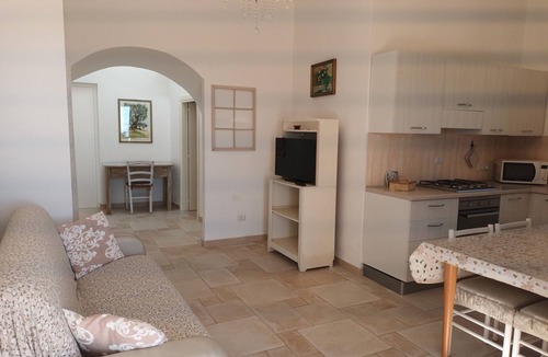 L'Assunta Villa | Panoramic trulli for 7 people in the hills with exclusive swimming pool 8 km from the sea