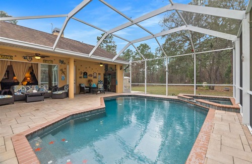 Brooksville House | Paradise found! Private heated pool spa . 3700 sq ft of luxury on 2+ acres!