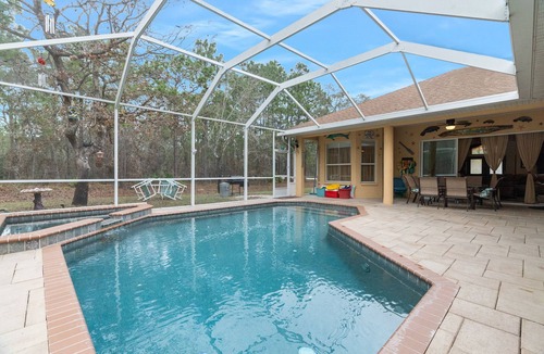 Brooksville House | Paradise found! Private heated pool spa . 3700 sq ft of luxury on 2+ acres!