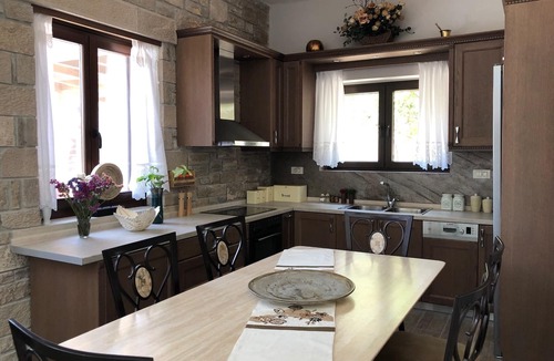 Koutsouras Villa | Paradisos traditional stone villa with whirlpool next to beach