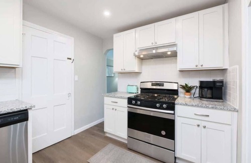 University Heights House | Park-side family retreat with private backyard