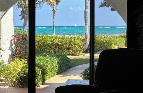 West Bay Condo | "Parrot 6" 37 Steps To The Ocean! Quiet, Ocean View