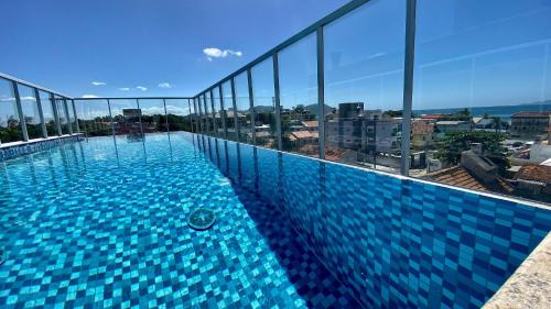 Ingleses Sul Apartment | Passos da praia c/piscina apto iluminado e novo