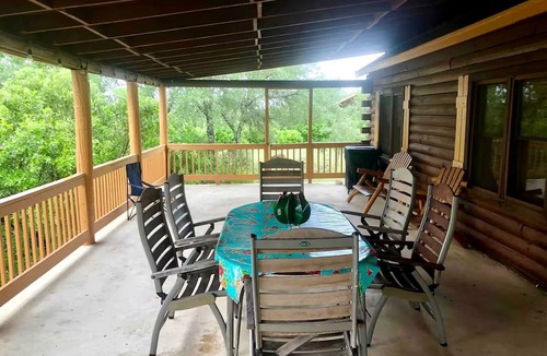 Mico Cabin | Peaceful and Pet Friendly Log Cabin near Medina Lake, Perfect for a Texas Hill Country Getaway